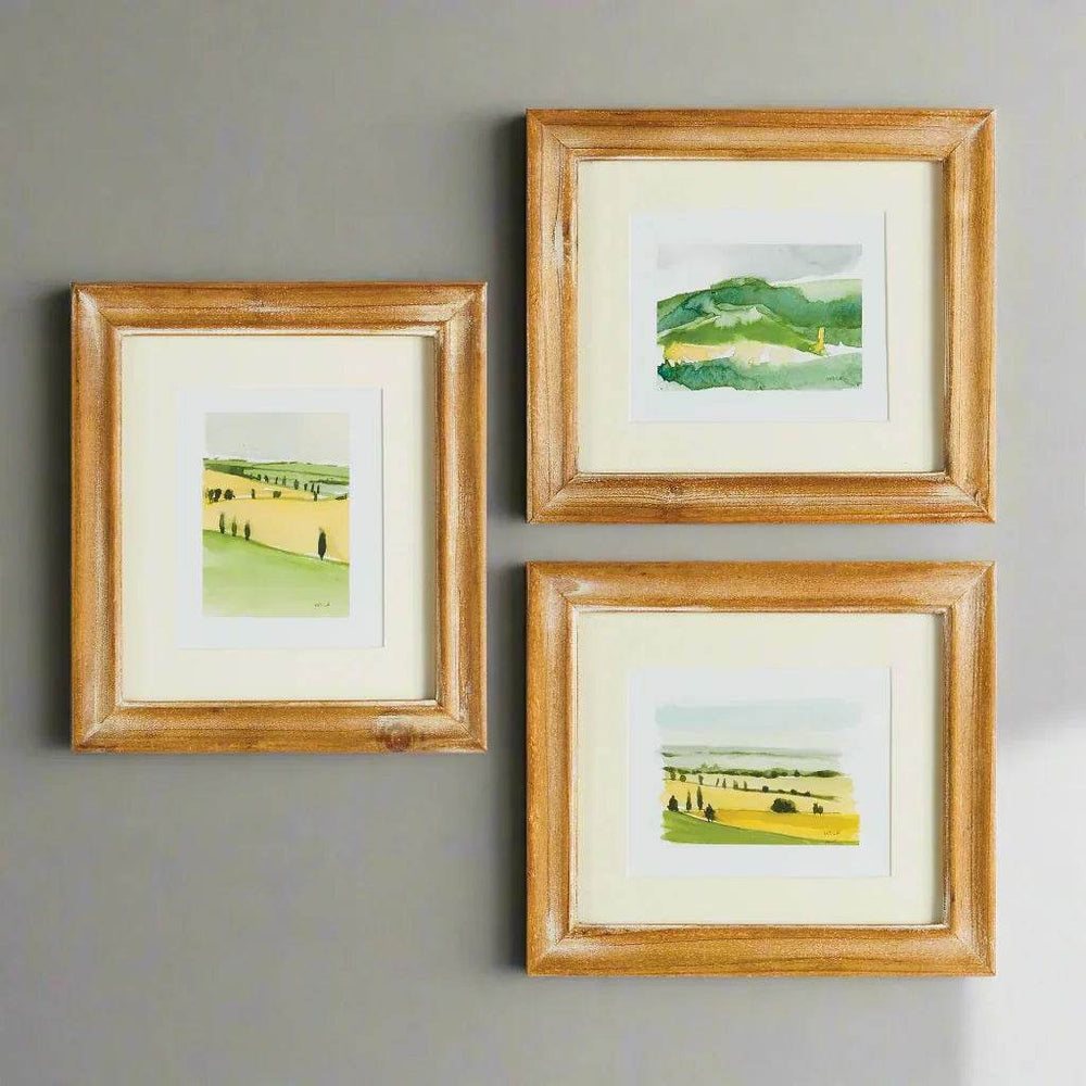 Set of three framed Italian landscape prints by Whitney Wolf styled on neutral wall, watercolor countryside art under glass for home decor – Modern Traditional.

