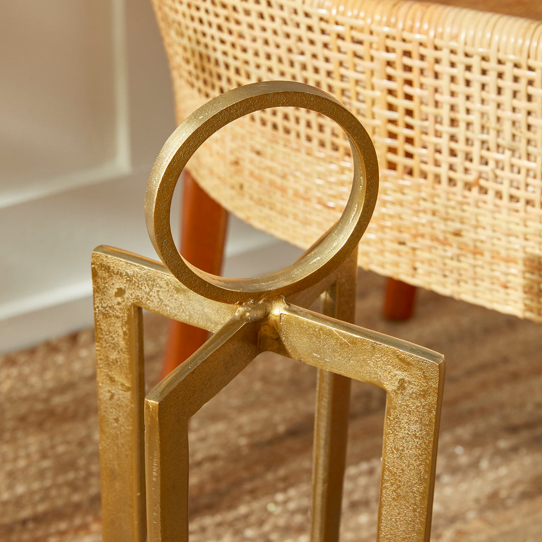 Close view of antique gold geometric metal lantern ring handle and upper frame detail, sculptural lantern Transitional style
