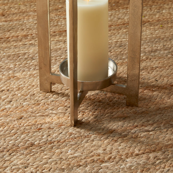 Close view of antique silver geometric metal lantern raised candle platform and lower frame detail, Transitional style
