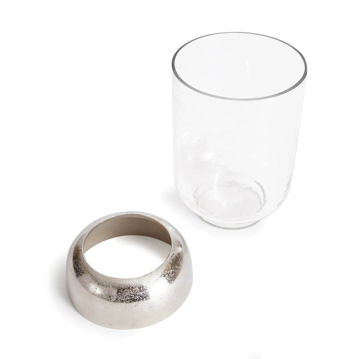 Disassembled view of two-piece hurricane candle holder: hammered glass cylinder and silver aluminum base – Transitional Modern

