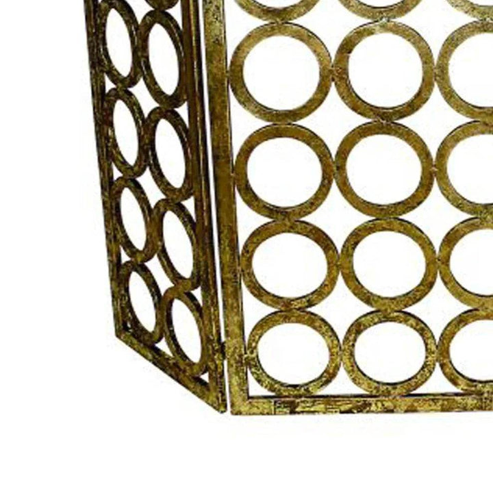 Side view detail of Italian-style fireplace screen with layered circle cutouts – Old World Glam.

