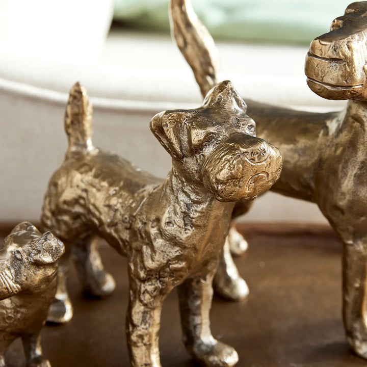 Gold dog figurines with sculptural detail and textured finish, medium view of decorative tabletop animal accents – Transitional