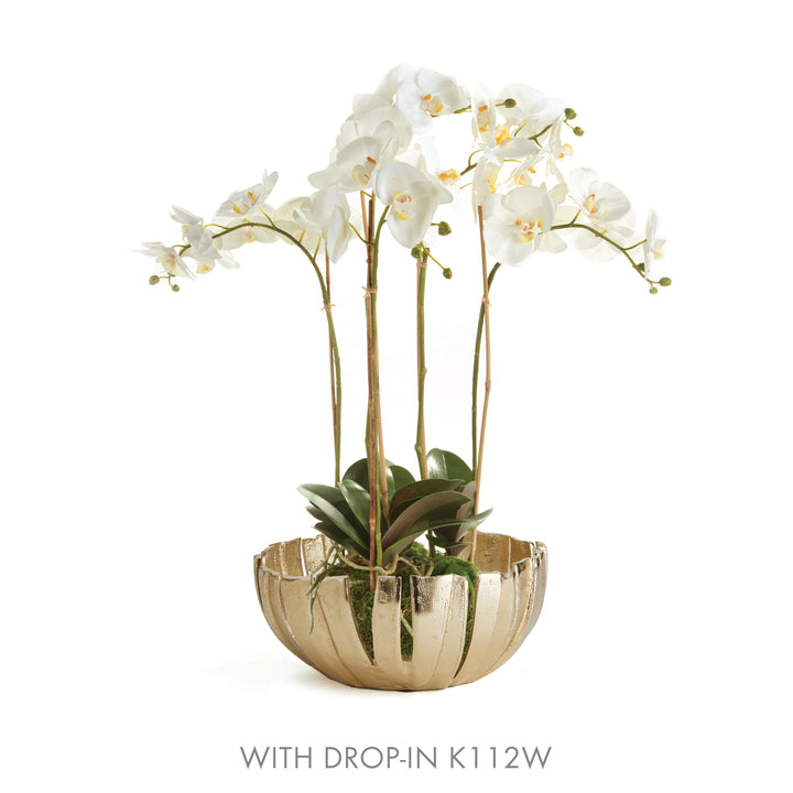 Gold decorative metal bowl with white orchid drop-in, modern centerpiece with abstract petal design for home styling.

