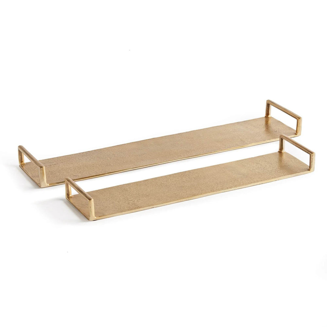Set of two long gold cast aluminum decorative trays with open rectangular handles on a clean white background – Transitional.