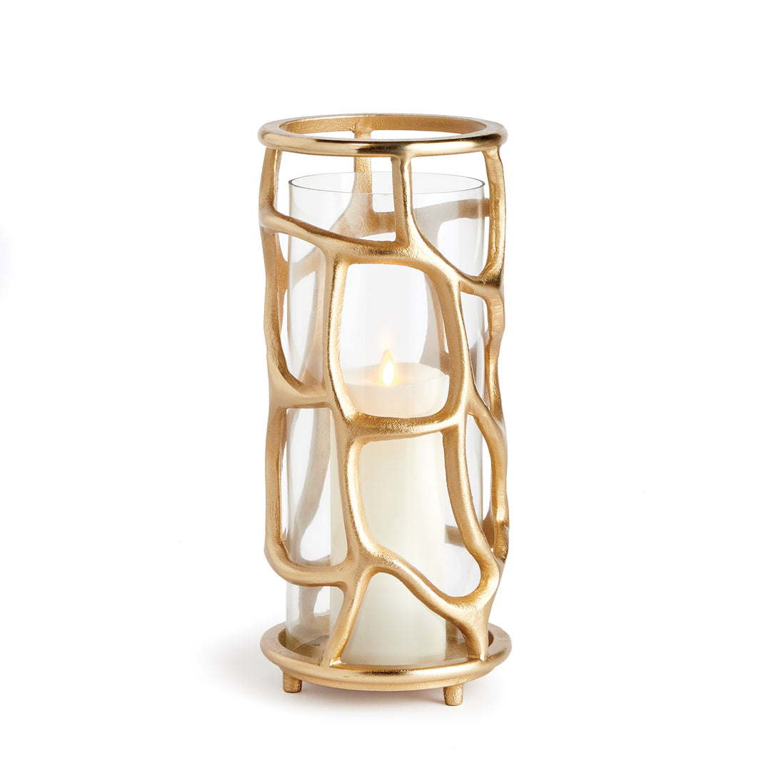 Gold sculptural hurricane candle holder with organic cast aluminum frame and clear glass insert, luxury modern candle holder
