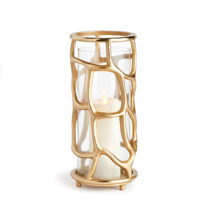 Gold sculptural hurricane candle holder with organic cast aluminum frame and clear glass insert, luxury modern candle holder