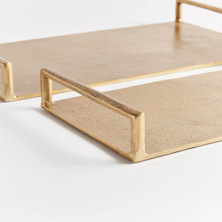 Side profile of gold textured decorative trays, set of two; rectangular frames with open handles, balanced – Transitional.