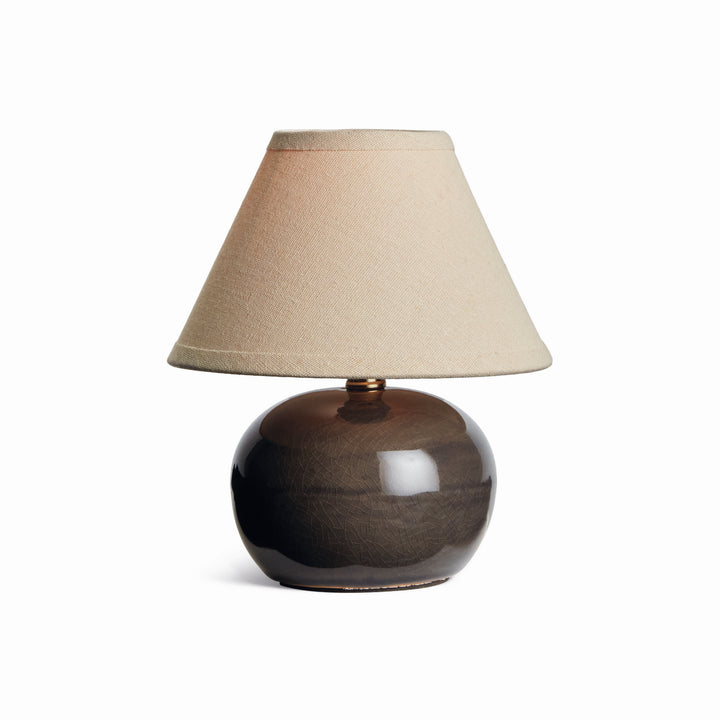 Gray ceramic mini table lamp with a rounded glazed base and tapered cream linen shade on plain white - Coastal Transitional