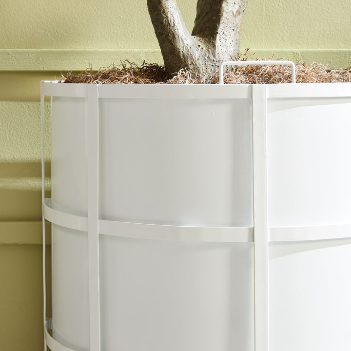 Close-up of white half-round iron planter with vertical banding and clean powder-coated finish, styled for transitional outdoor spaces.