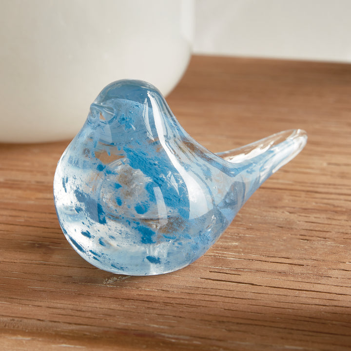 Single hand blown blue glass finch sculpture with rounded form and glossy finish, small decorative bird for tabletop styling.
