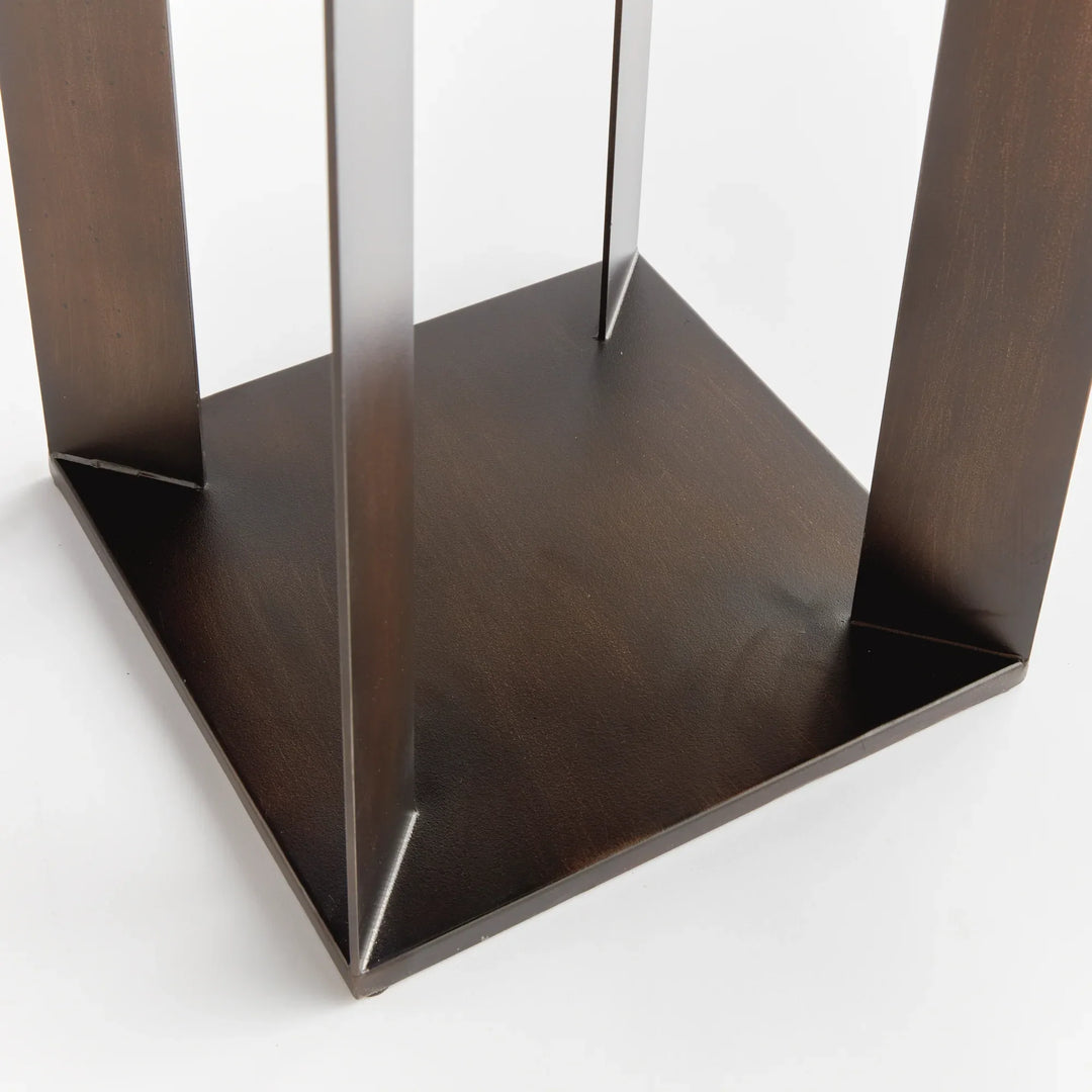 Close-up of powder-coated iron lantern base showing clean edges and solid construction, modern outdoor decorative lighting detail