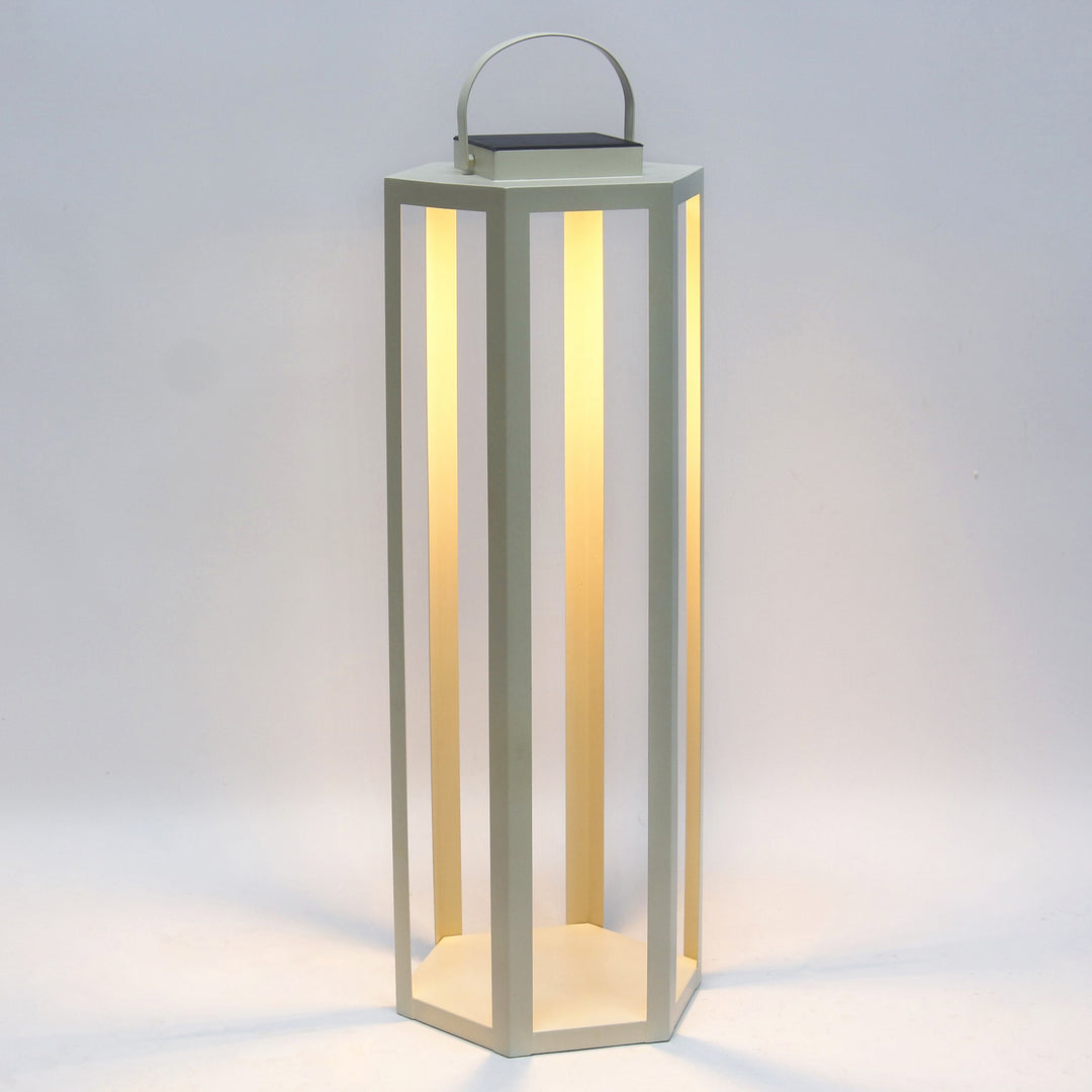 Ivory solar LED lantern with powder-coated iron frame, integrated solar panel, and warm 3000K illumination in a 30-inch height – Modern Coastal