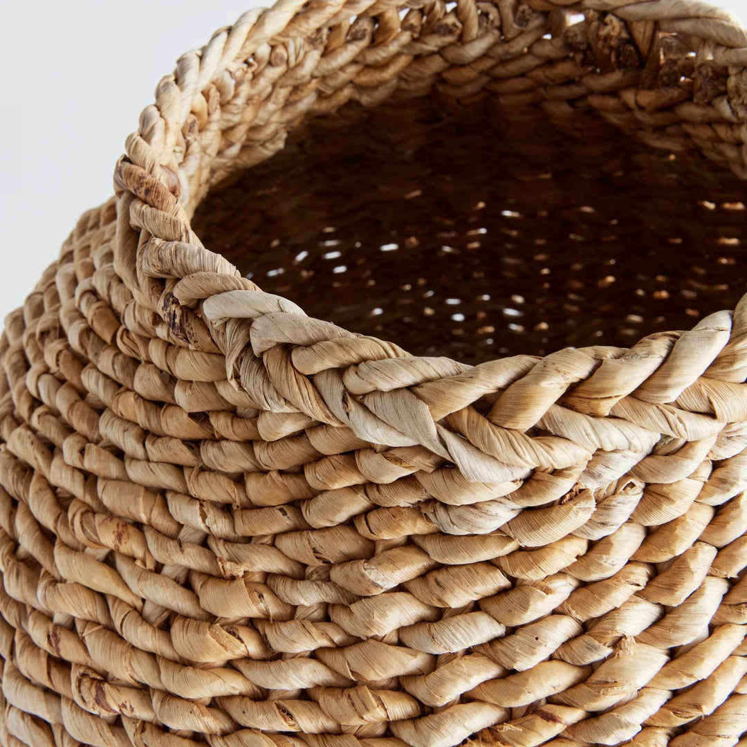 Close-up of large handwoven abaca vase rim showing braided detail and interior weave in natural tan finish – Boho