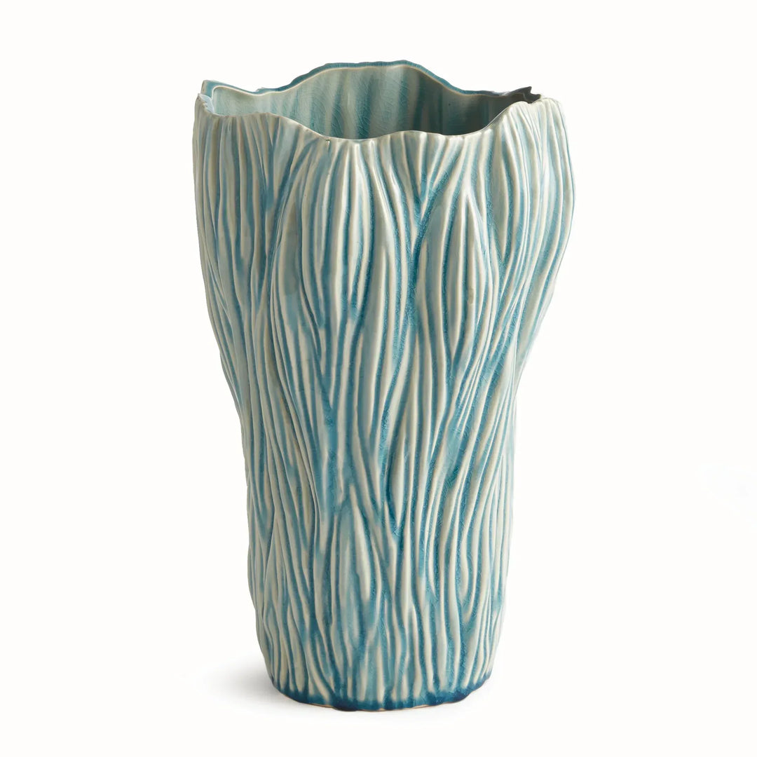 Large blue reactive glaze ceramic vase with flowing raised texture and an irregular rim, shown on white, Coastal Transitional