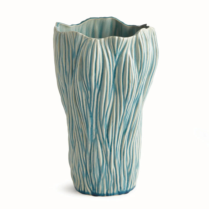 Large blue reactive glaze ceramic vase with flowing raised texture and an irregular rim, shown on white, Coastal Transitional
