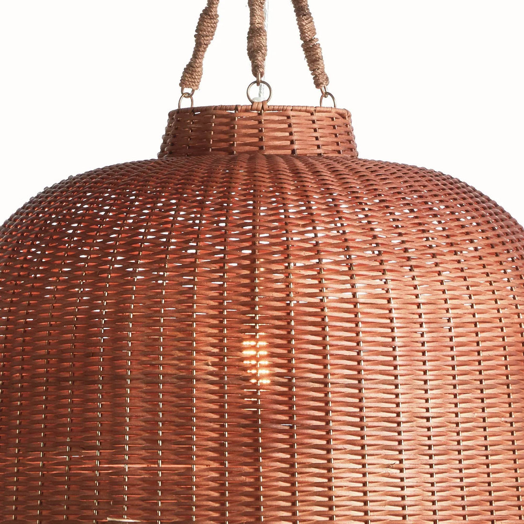 Large brown rattan pendant shoulder close-up showing the woven surface, top collar and jute-wrapped supports, Coastal style