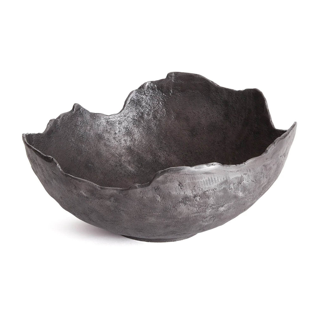 Sculptural black metal bowl with organic edge, styled as a large centerpiece bowl for dining table, Industrial Luxe decor
