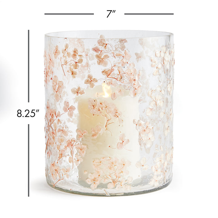 Large clear pink glass hurricane candle holder dimensions shown as 7 inches wide by 8.25 inches high, Romantic Transitional
