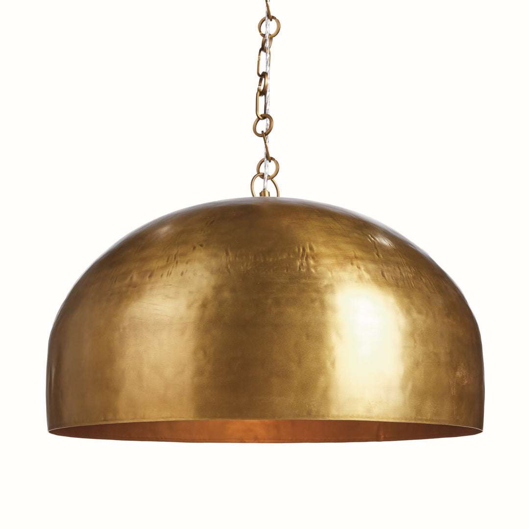 Large gold iron dome pendant light with chain suspension and hand worked metal shade shown against white background. Contemporary