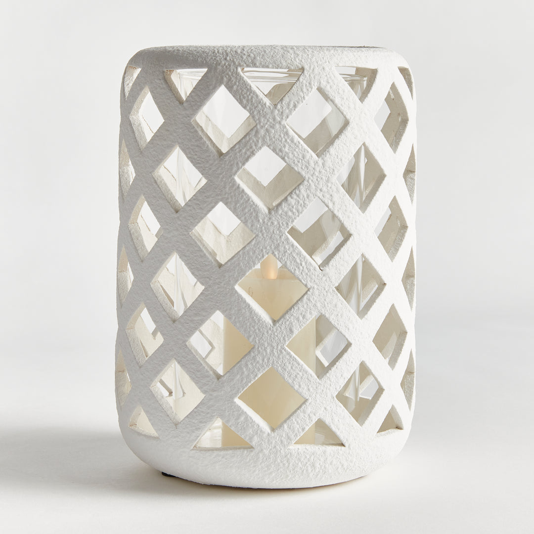 Close-up of large moss terracotta hurricane candle holder with textured lattice detailing – European Rustic style.