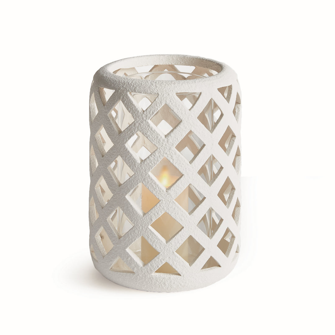 Large white terracotta hurricane candle holder with lattice cutout detailing and glass insert – Coastal Transitional style.