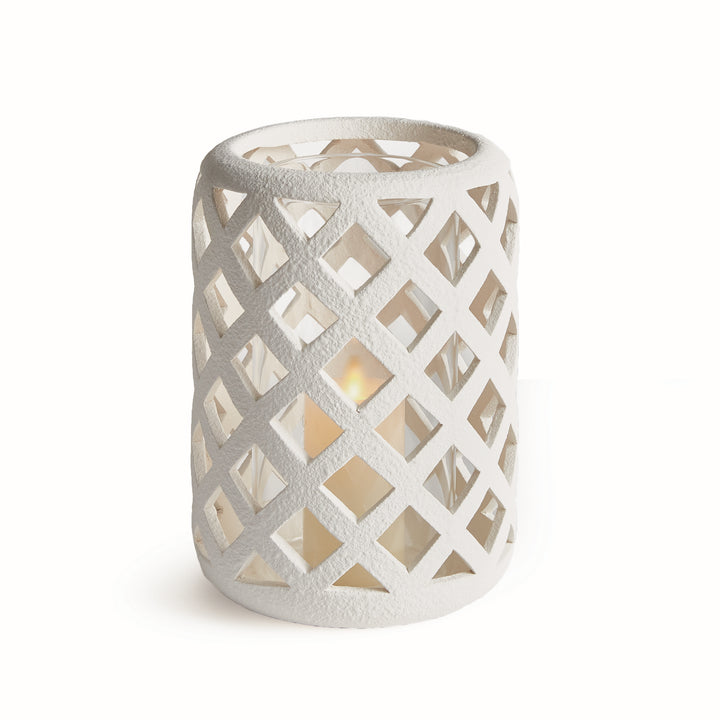 Large white terracotta hurricane candle holder with lattice cutout detailing and glass insert – Coastal Transitional style.