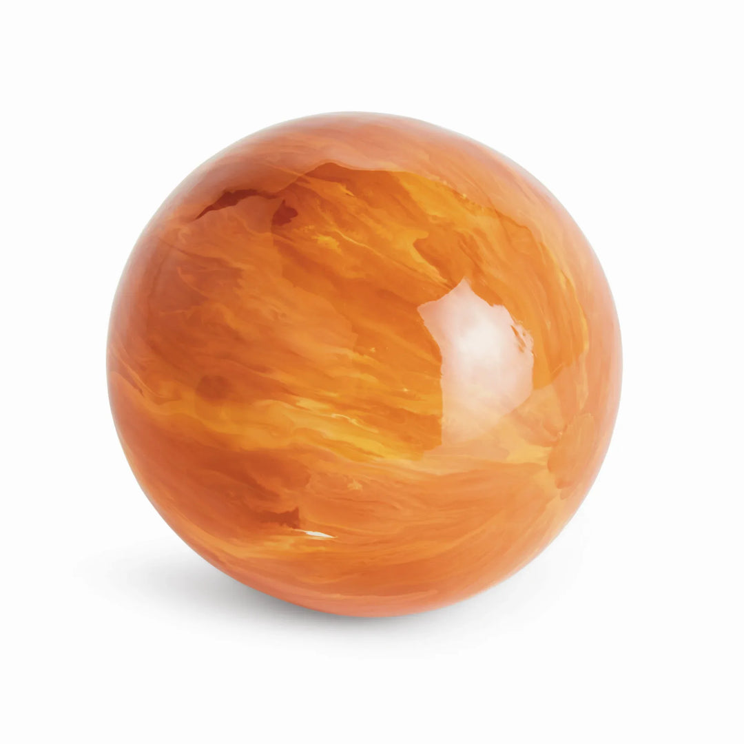 Large orange decorative orb with glossy marbled hand painted finish in iron shown front view for tabletop decor Modern Organic style