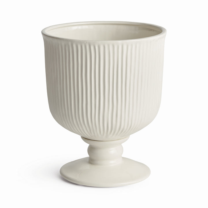 Large white ceramic footed cachepot showing fine vertical ribbing, rounded body and a circular pedestal base, Traditional