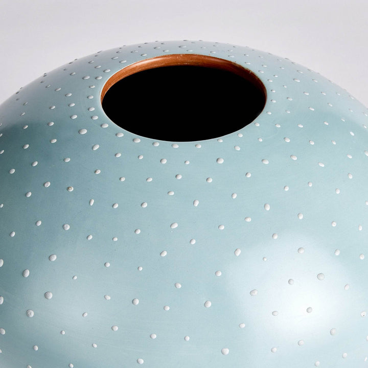 Close-up of vase opening with visible clay rim and hand-applied stipple texture on light blue ceramic body – Modern Organic.

