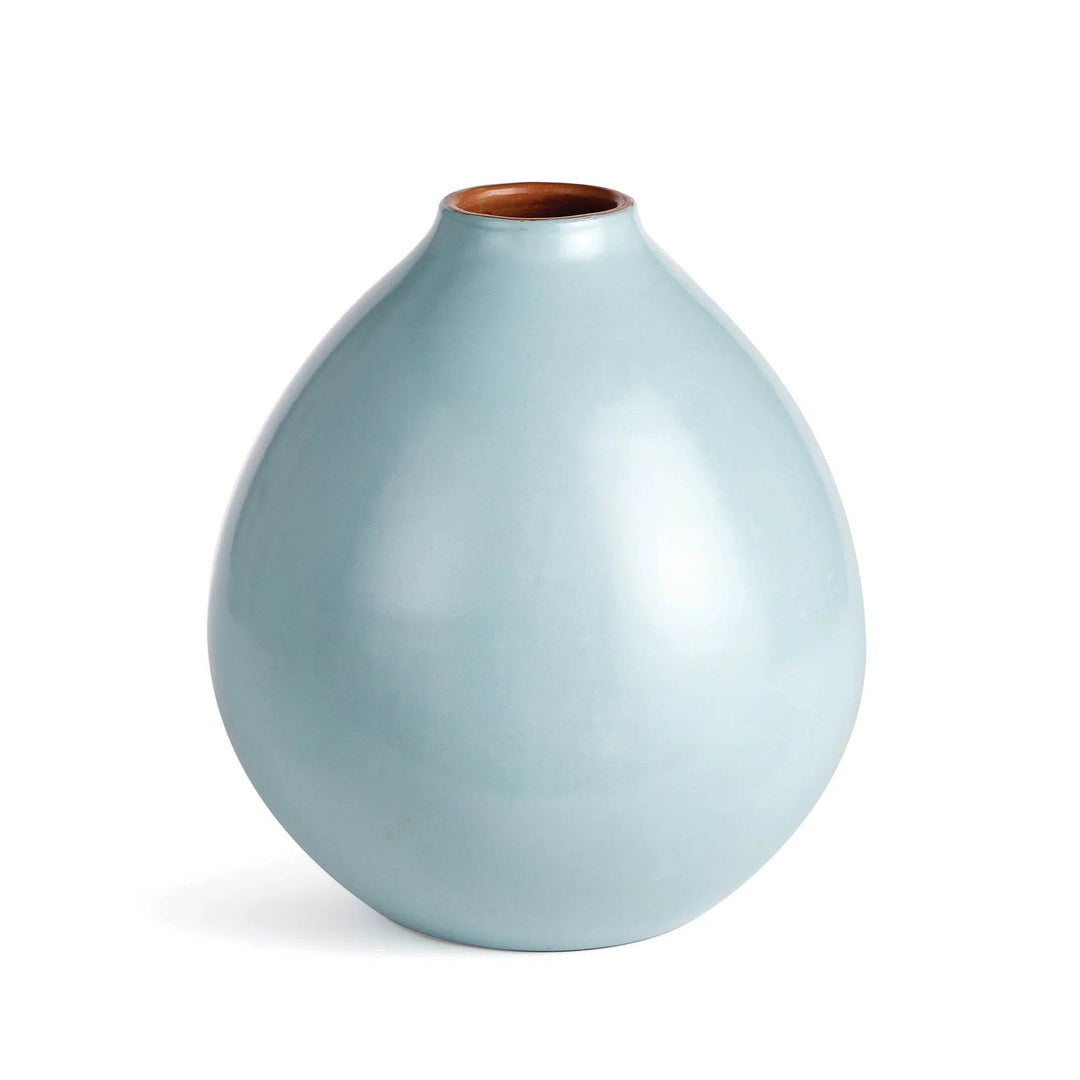 Light blue ceramic vase with smooth finish and rounded silhouette, displayed on white background – Modern Organic.