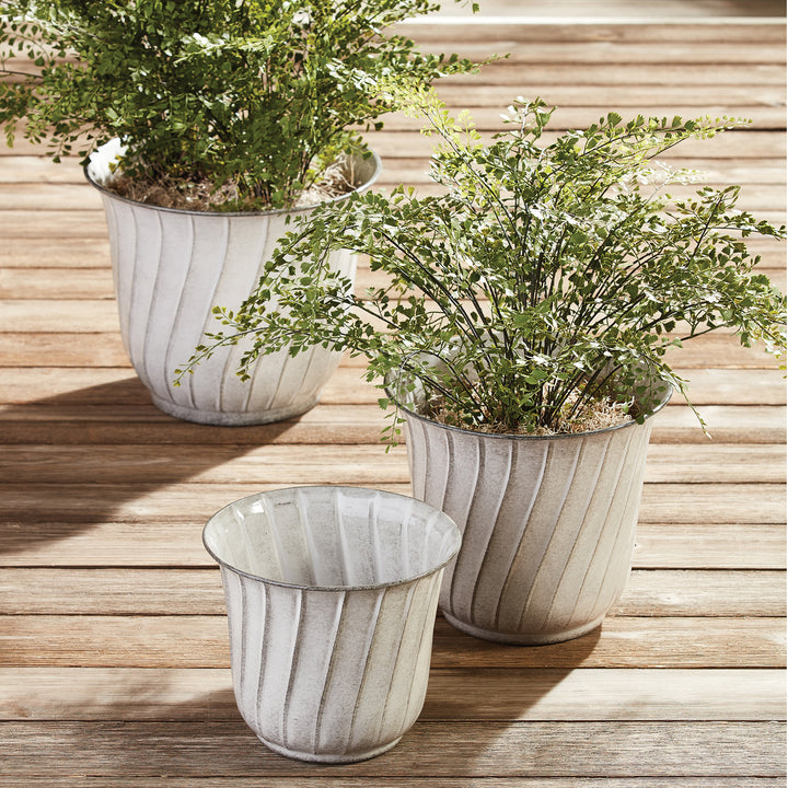 23-inch artificial maidenhair fern displayed in a fluted planter on wood, beside coordinating empty pottery. Transitional
