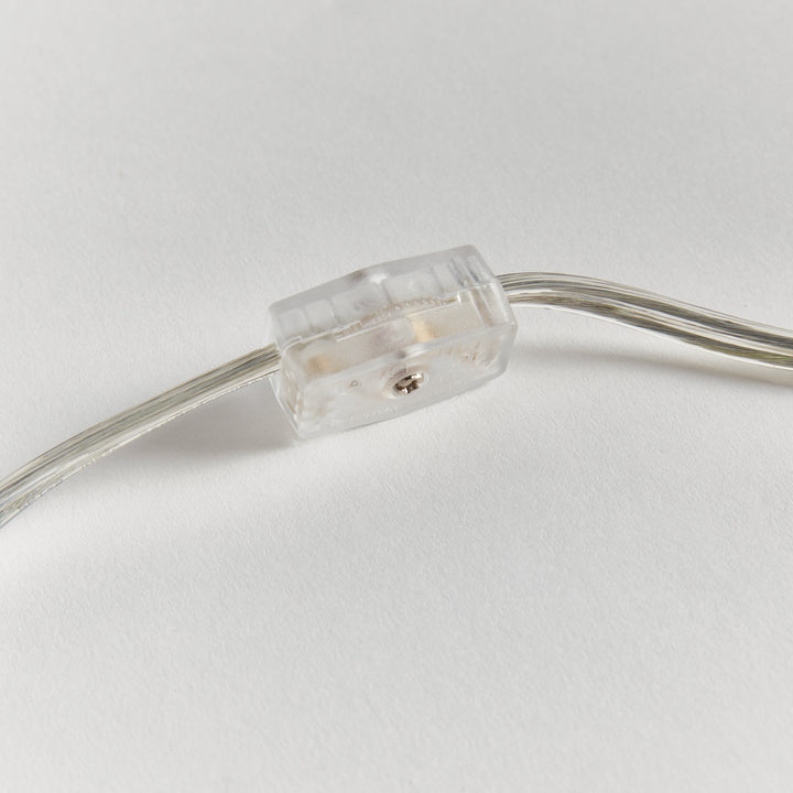 Mini ceramic table lamp clear power cord closeup detail showing transparent cord modern accent lighting style