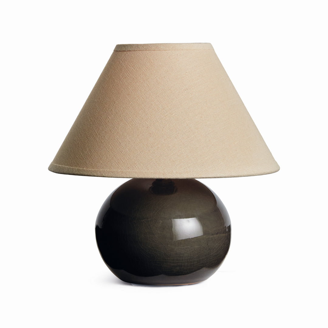 Gray mini ceramic table lamp with linen shade and crackle glaze base on white background modern accent lighting style