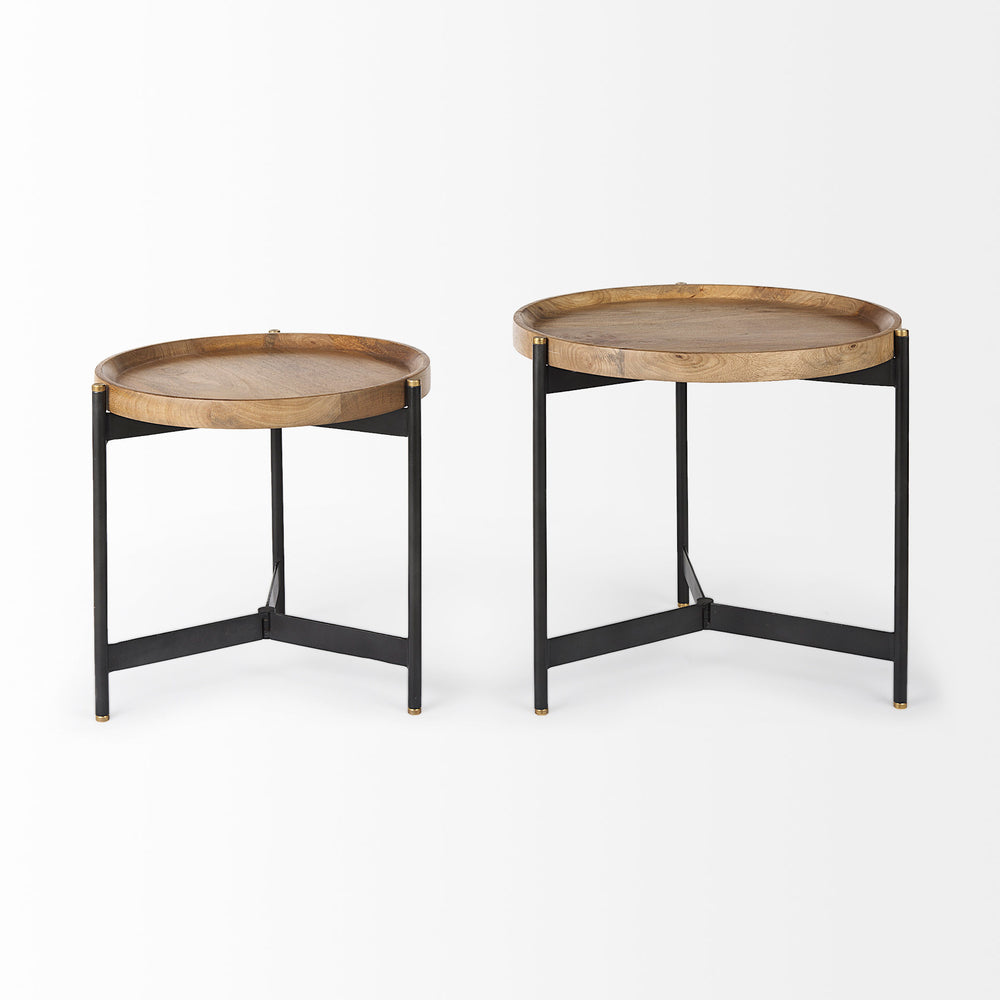 Front view of round mango wood nesting side tables with black iron tripod bases and raised tray tops – Modern Organic