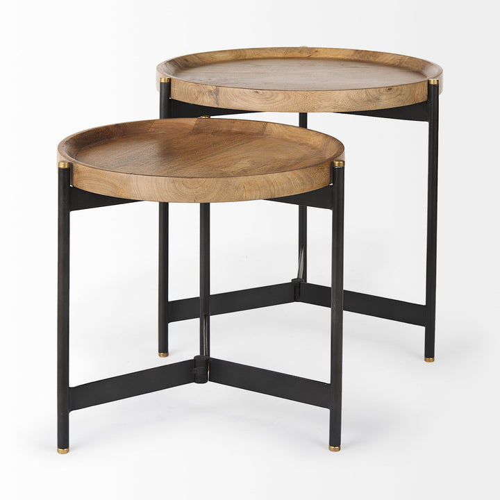 Set of two round mango wood nesting side tables with black iron bases, tray tops, and gold metal caps – Modern Organic