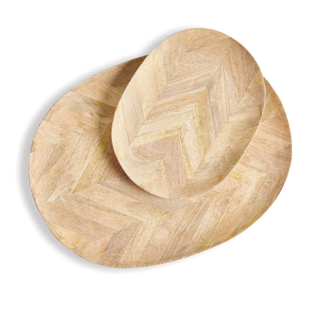Set of 2 mango wood oval serving trays with natural patterned design, shown stacked, ideal for styling kitchen or dining spaces.

