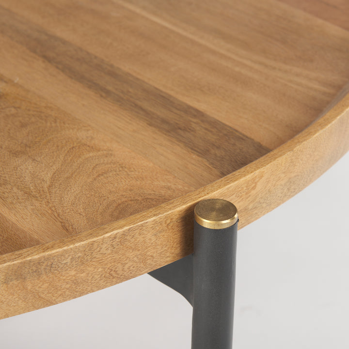 Close-up of solid mango wood tray edge with black iron leg and gold metal cap detail – Modern Organic