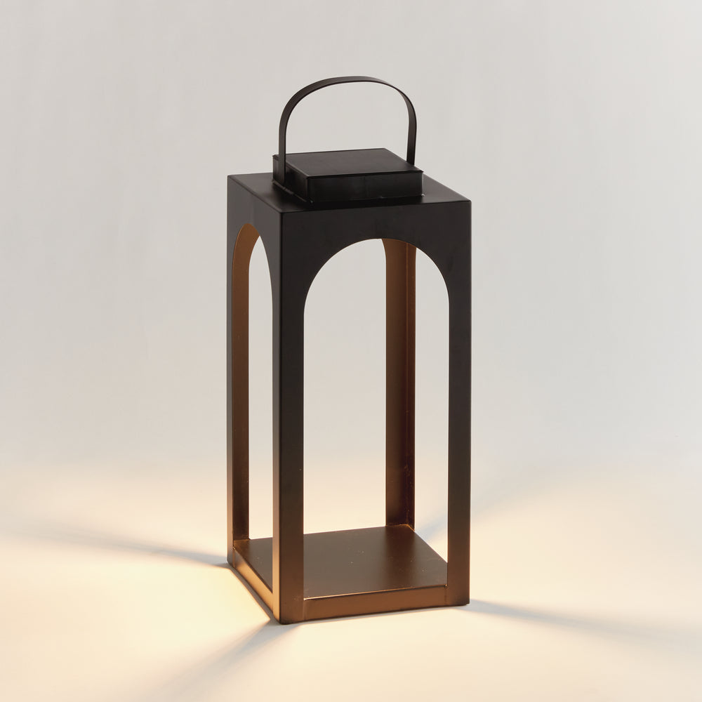 Matte black modern arched solar LED outdoor lantern with powder-coated metal frame and warm 3000K illumination in an 18-inch height – Transitional