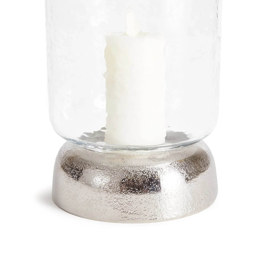 Close-up of silver metal dome base supporting small hammered glass hurricane – Transitional Modern

