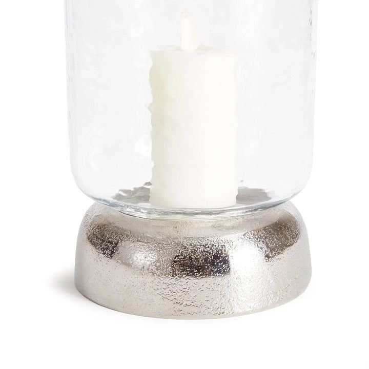 Close-up of silver metal dome base supporting small hammered glass hurricane – Transitional Modern

