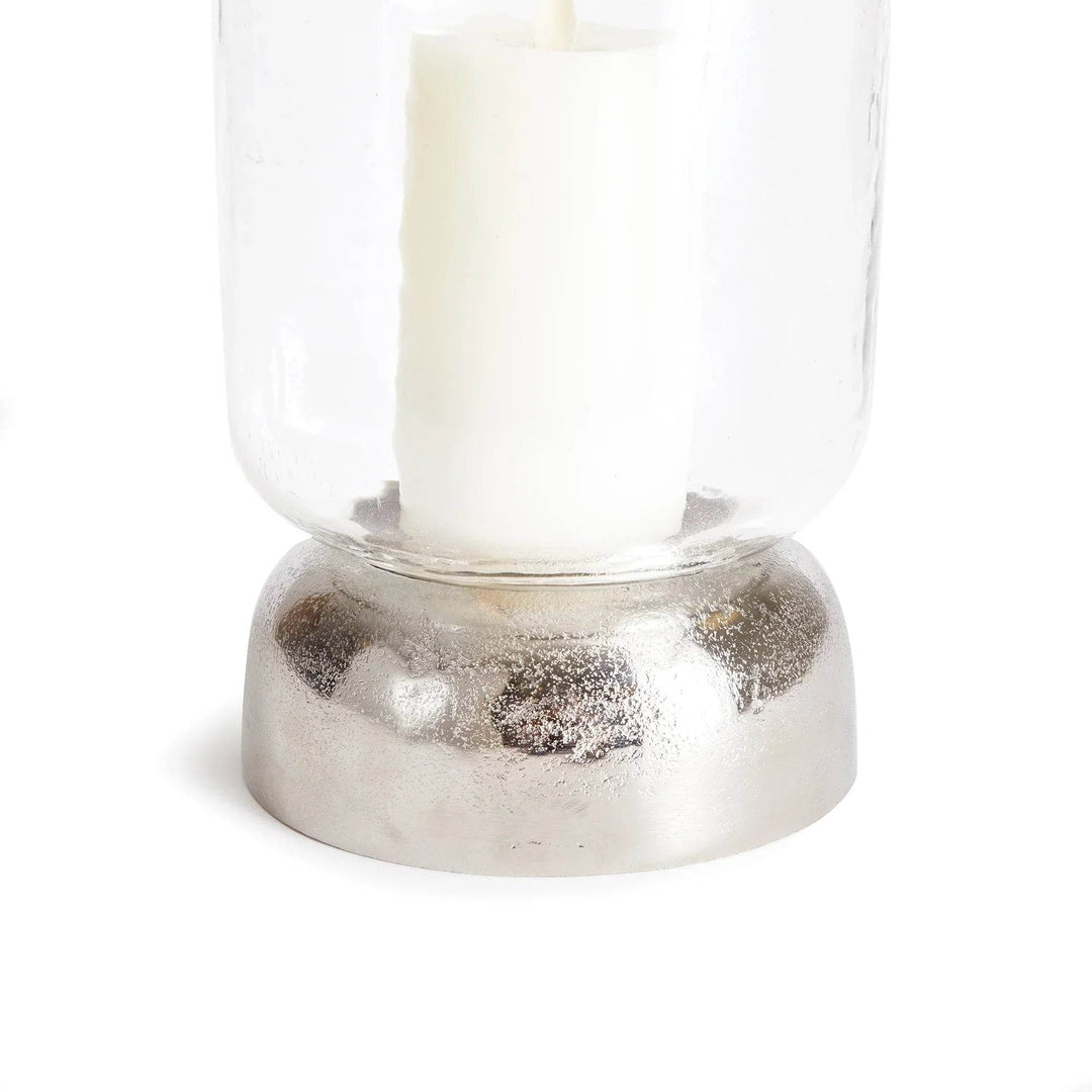 Silver metal base detail of glass hurricane candle holder, showcasing polished dome shape – Transitional Modern

