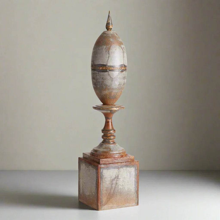 Detail shot of the finial's weathered antique galvanized iron finish, highlighting its raw texture and patina