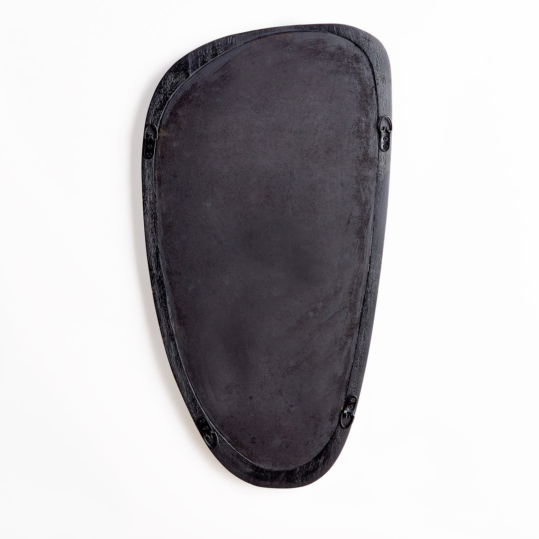 Back view of mid-century modern asymmetrical wall mirror showing dark finish and integrated hanging hardware.

