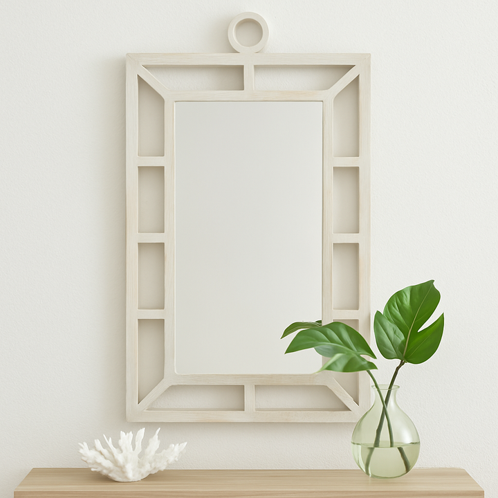 Minimalist coastal whitewash wood frame mirror in bright bedroom with natural textures