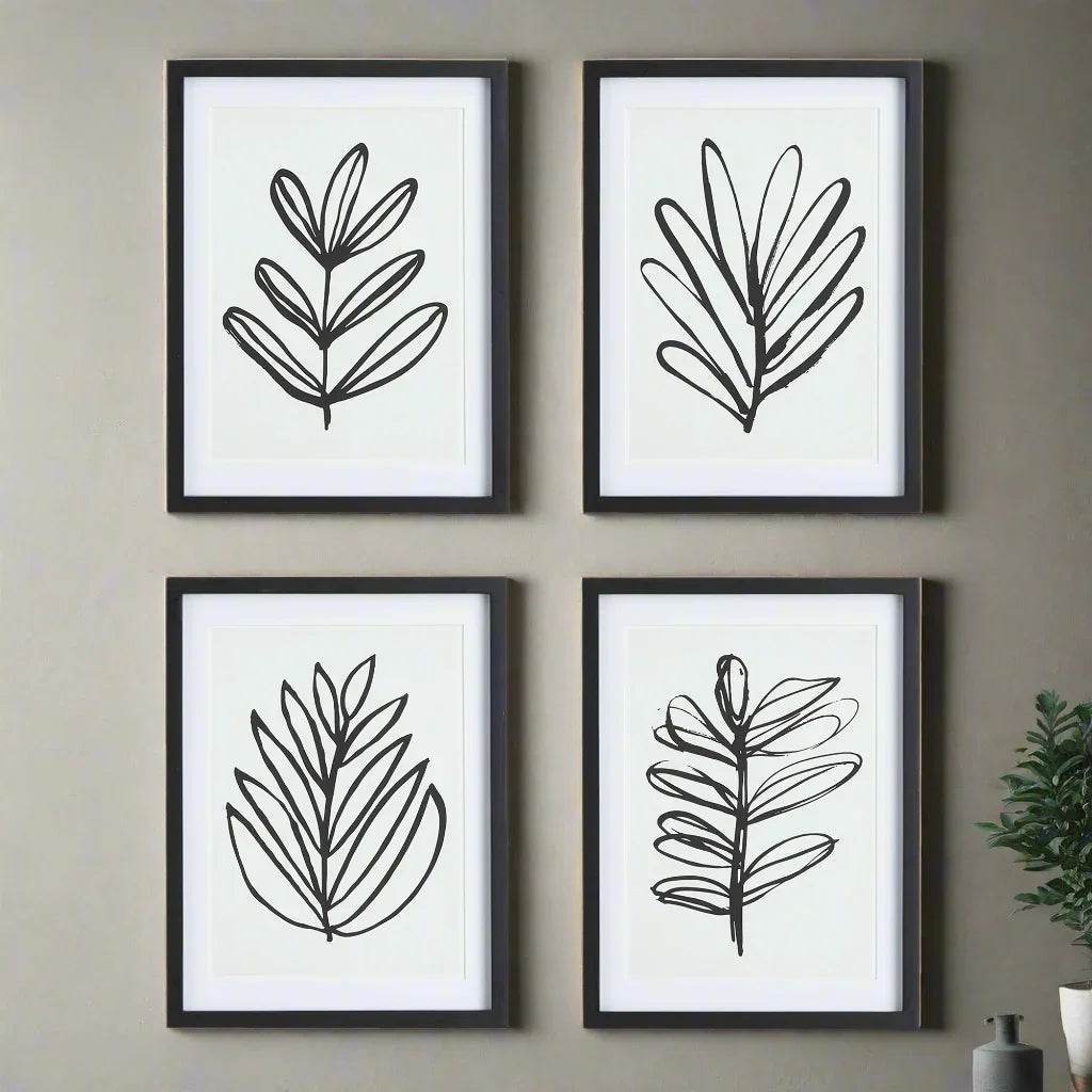 Detail of 4 black and white botanical leaf sketches in black wood frames with mat – modern minimalist styling