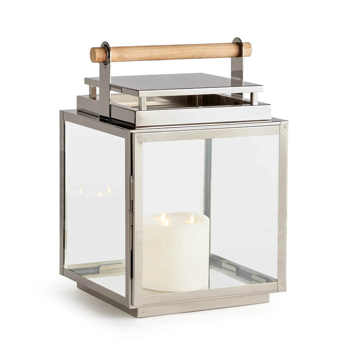 Large silver outdoor lantern with teak handle and glass panels, front angle.
