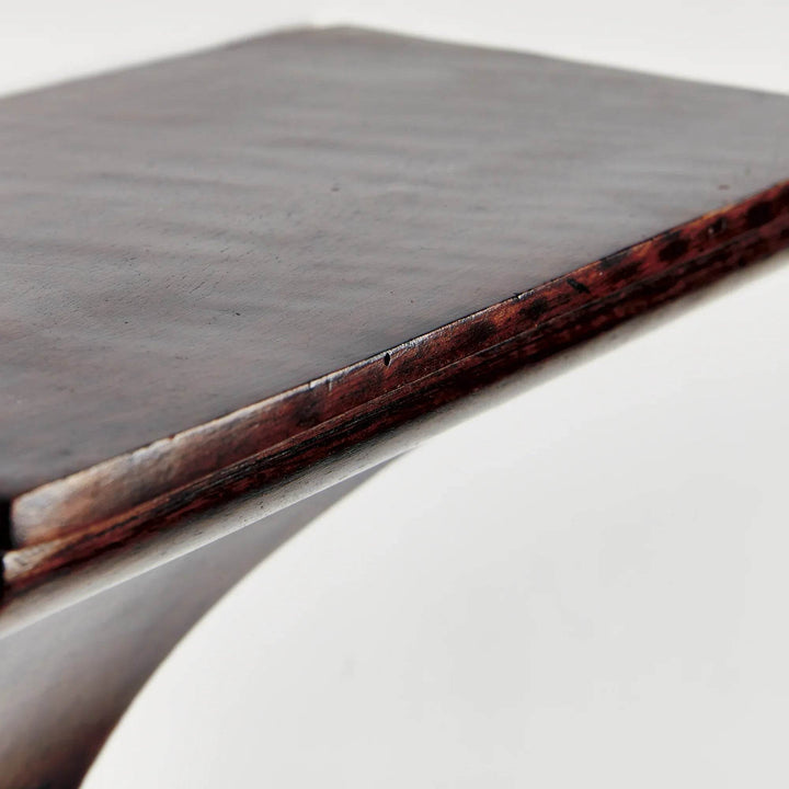 Close-up of mango wood wall bracket shelf showing antique brown hand-finished edge and natural grain – Modern Colonial
