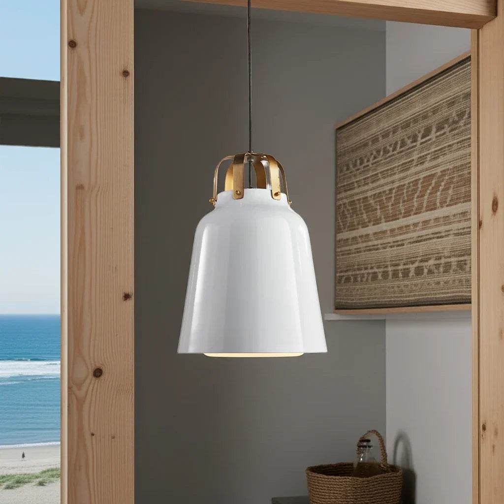 White and brass pendant light over modern entryway console – beach-style setting


