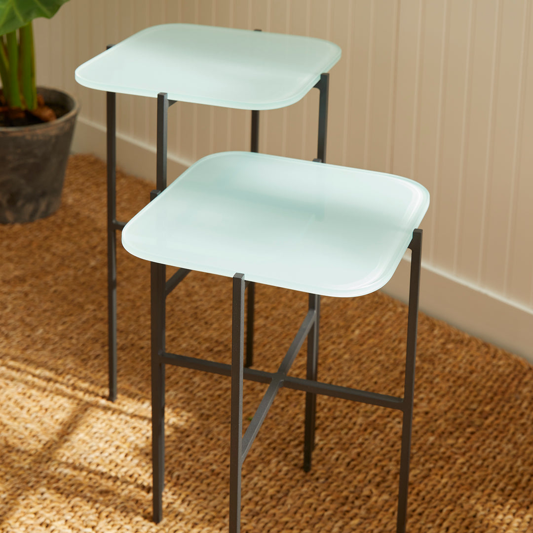 High angle view of modern icy blue side tables set of 2 on white background

