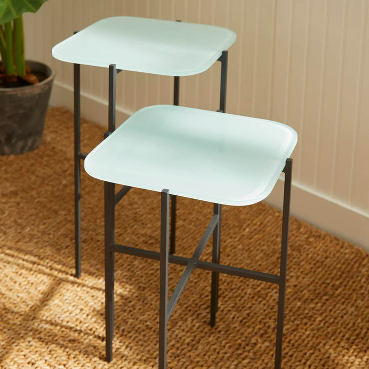 High angle view of modern icy blue side tables set of 2 on white background

